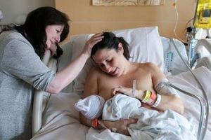 Chicago birth photography - mother nursing newborn